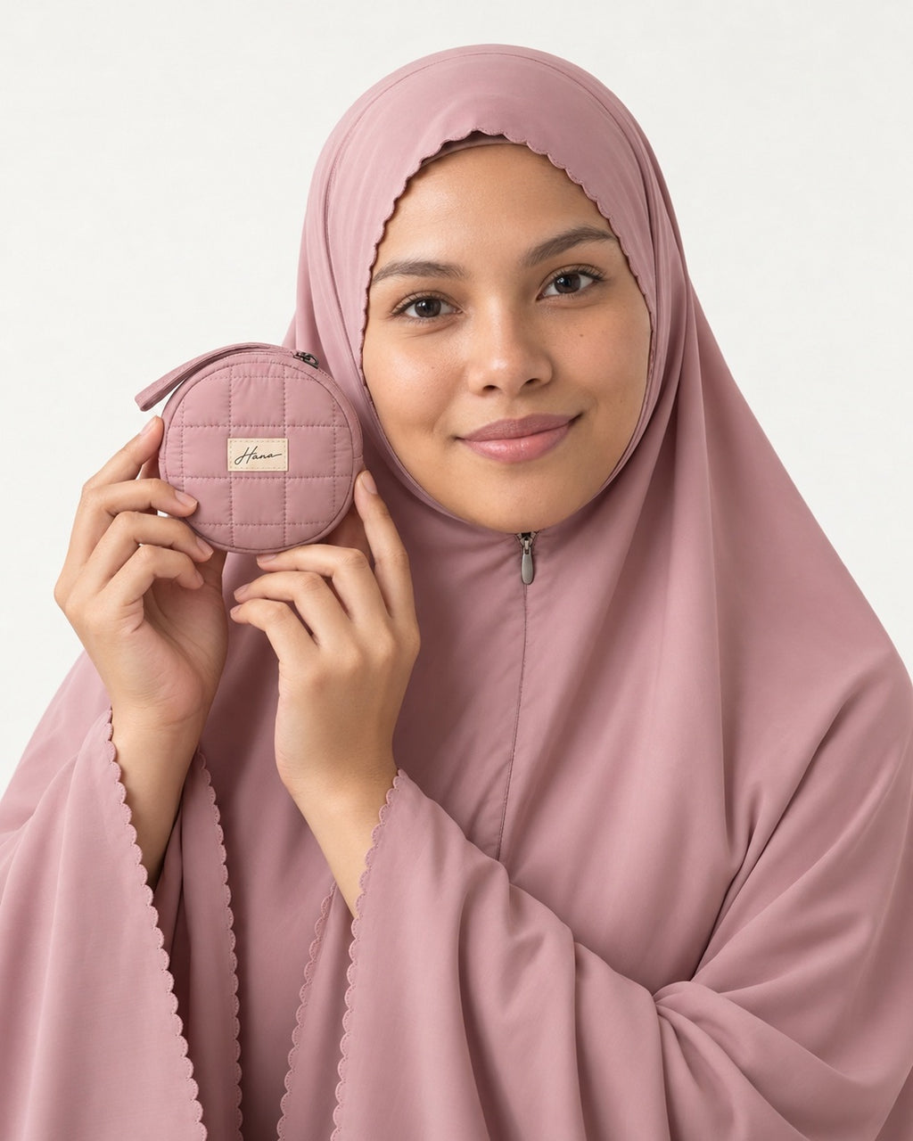 Pocket Prayer Outfit in Shafaq: the pouch is small enough to hold beside her face