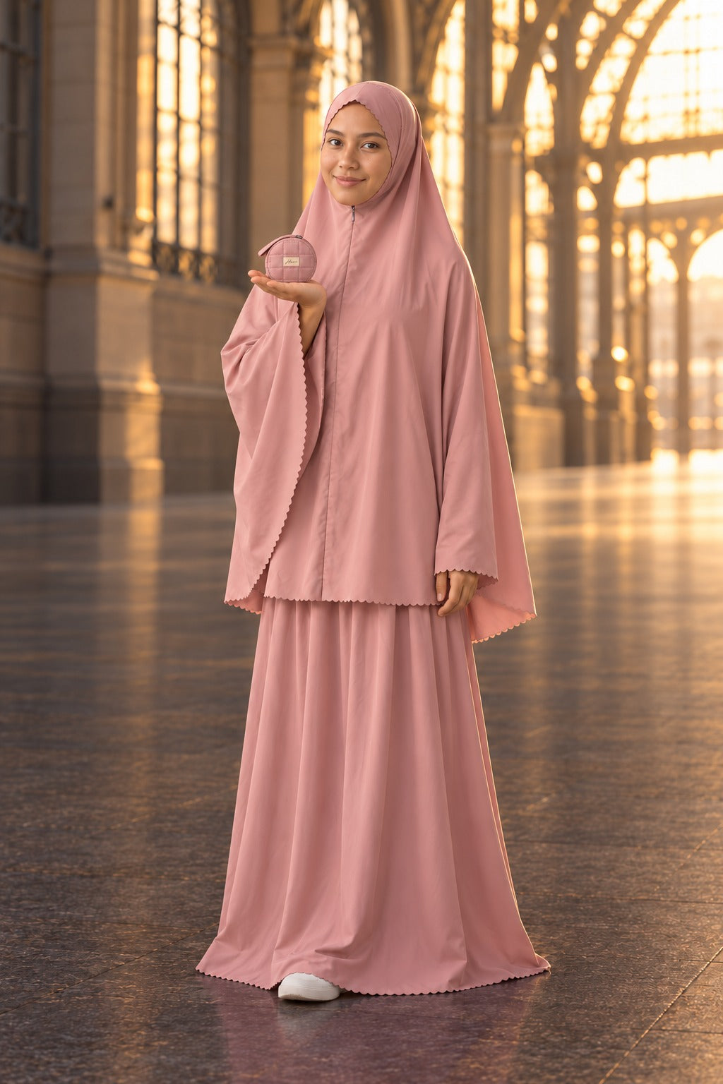Woman in the Shafaq Pocket Prayer Outfit in a railway station, showing the palm-size pouch