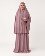 Pocket Prayer Outfit in Inab, light plum, pouch resting on her palm