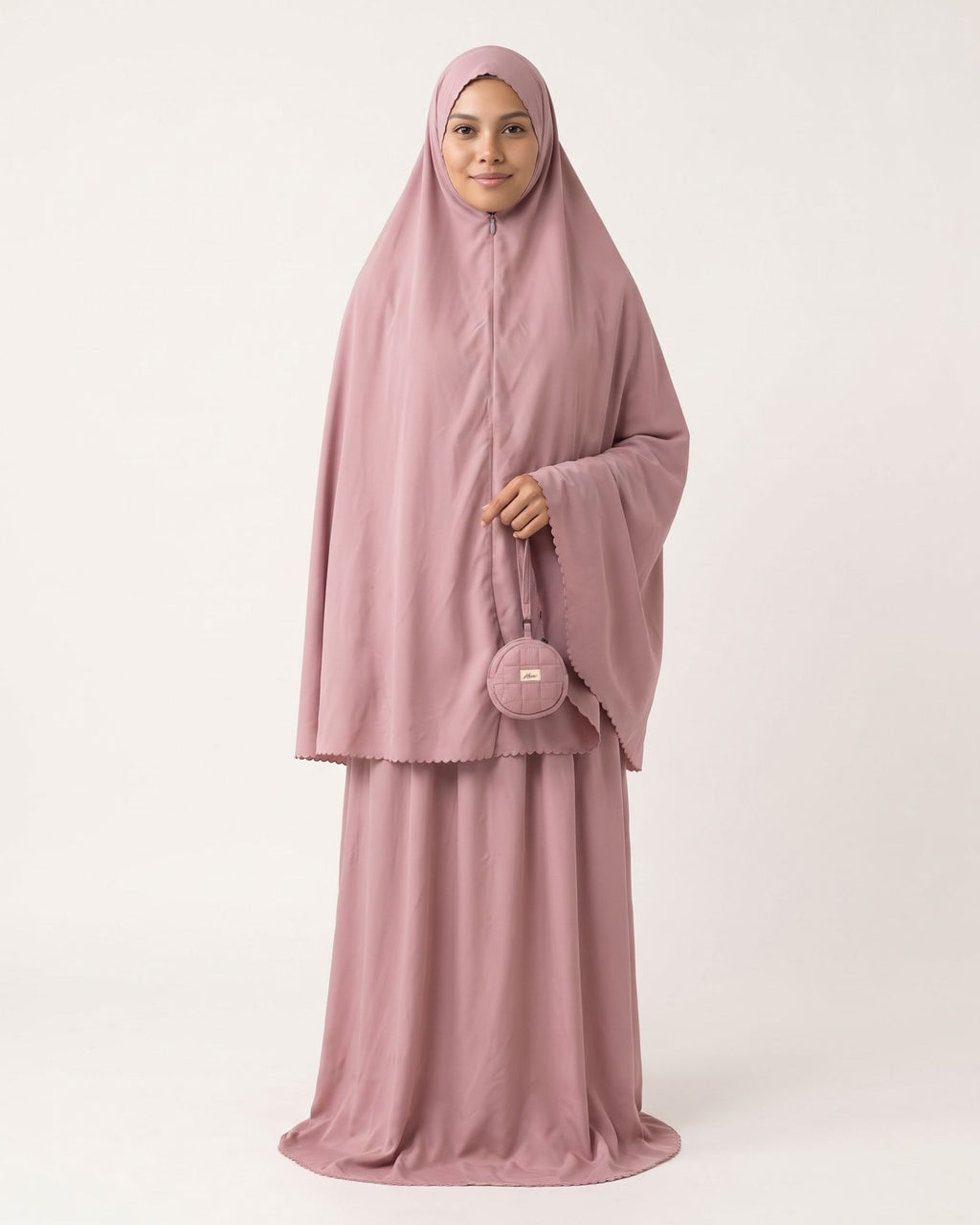 Pocket Prayer Outfit in Shafaq, sandy pink, worn with the matching pouch